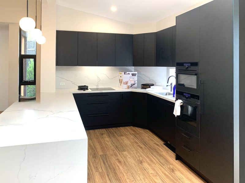 Monochrome finishes are striking and bold, and make the surfaces and cabinetry easy to read.