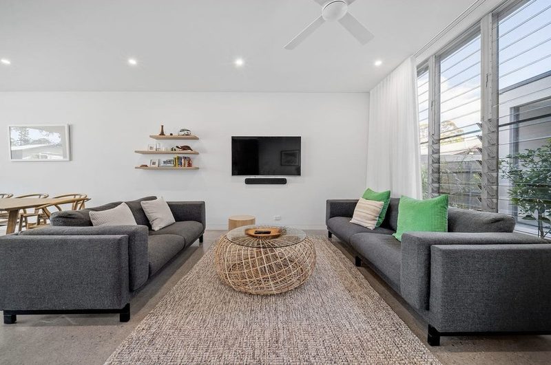 Lounge area as part of the large living area. Louvres open to the courtyard