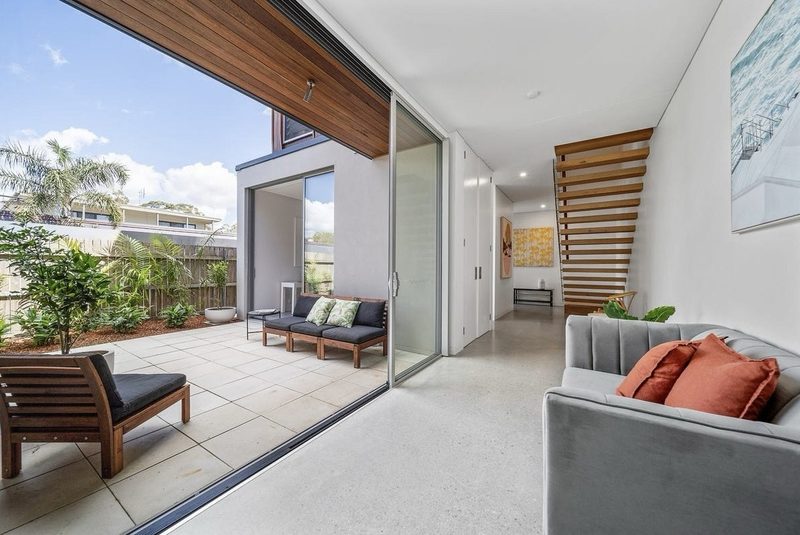 The hall becomes a part of the courtyard — this feels more like a convertible than a fixed home