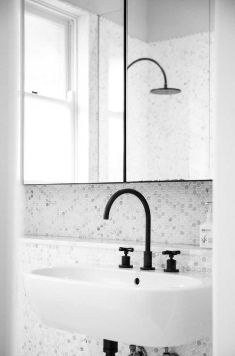 A second ensuite bathroom, finished in Bianco Carrara Marble and round marble tiles