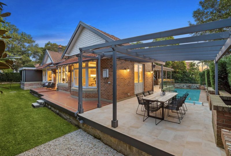 Heritage home and terrace lit at twilight, Mosman